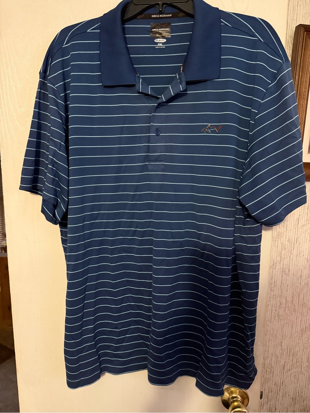 Greg Norman Collection Navy Blue Polo with Light Blue Stripes